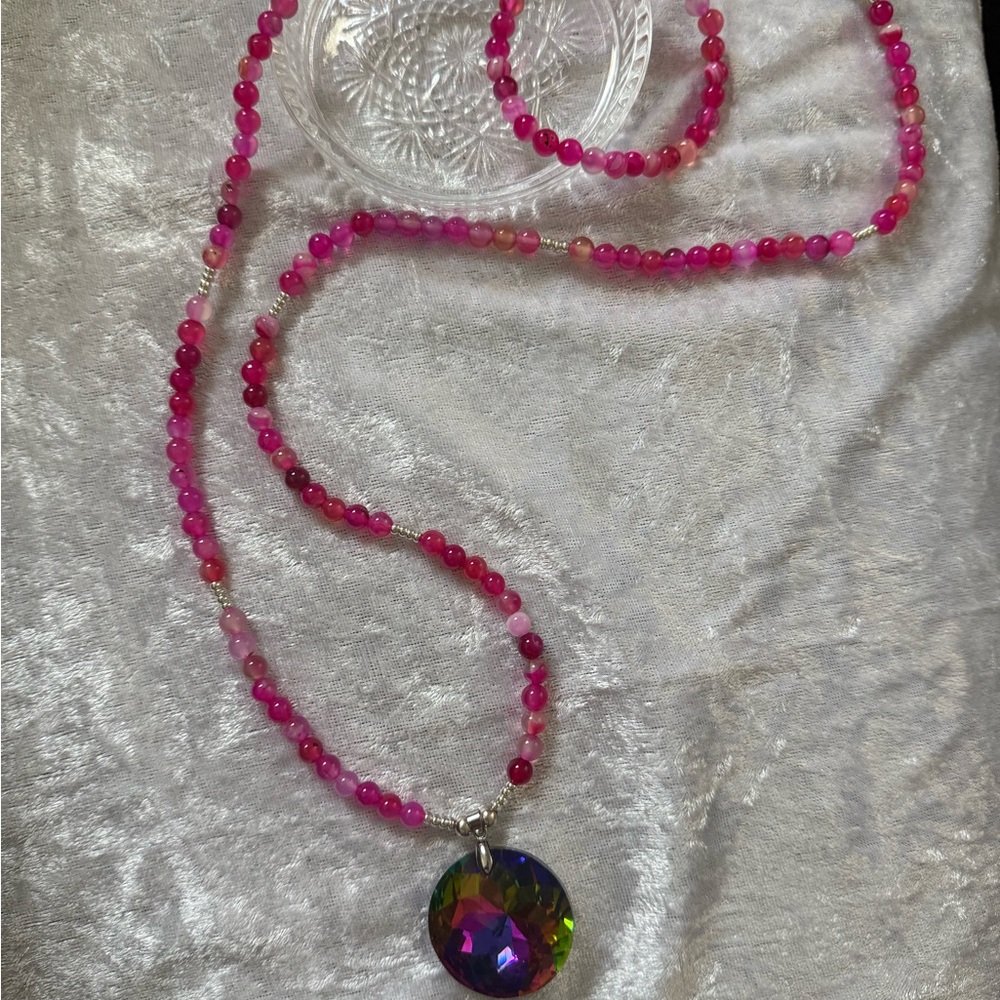 Elegant Pink Beaded Necklace with Multicolor Pendant.